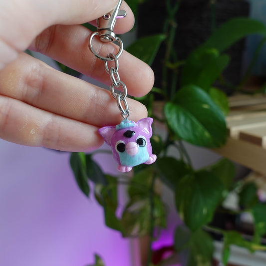 Furby Keychain from the 90s collection, featuring the iconic electronic pet character, perfect for nostalgic enthusiasts.