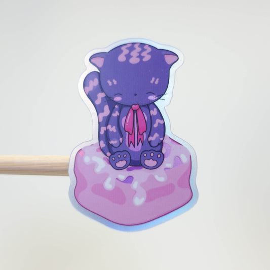 Cute kawaii cat curled up like a cinnamon swirl, autumn-inspired sticker from the Midnight Picnic collection by Uncomfy Cherry