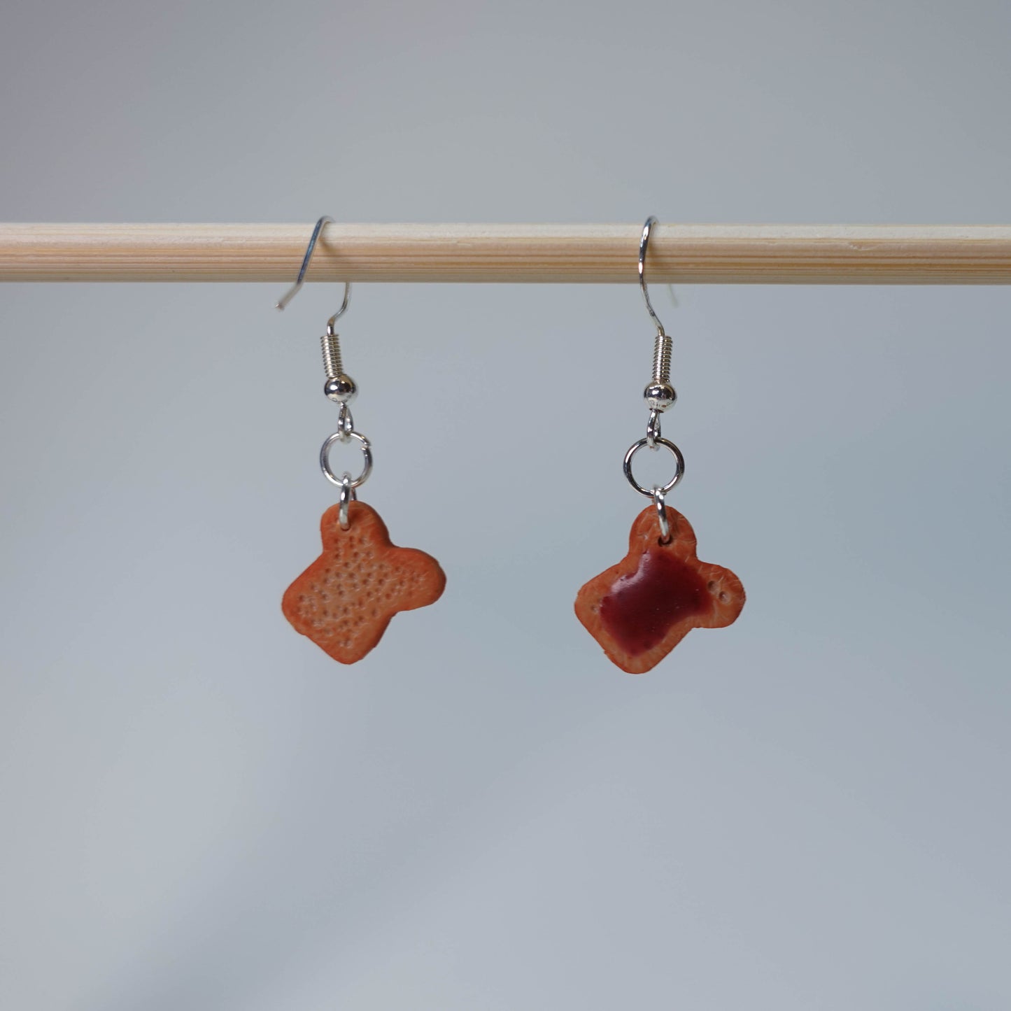 Handmade toast earrings with blueberry, strawberry, and slightly burned designs, five unique pairs, cute pastel jewelry accessory, limited edition.