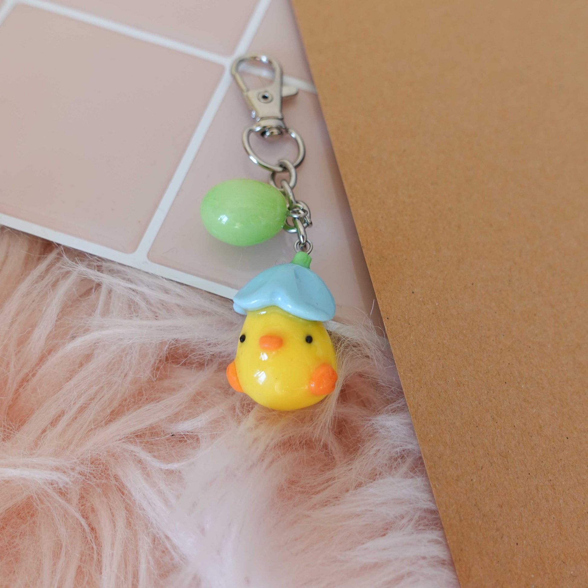 Charming duckling keychain designed for spring lovers, adding a playful element to your accessories.