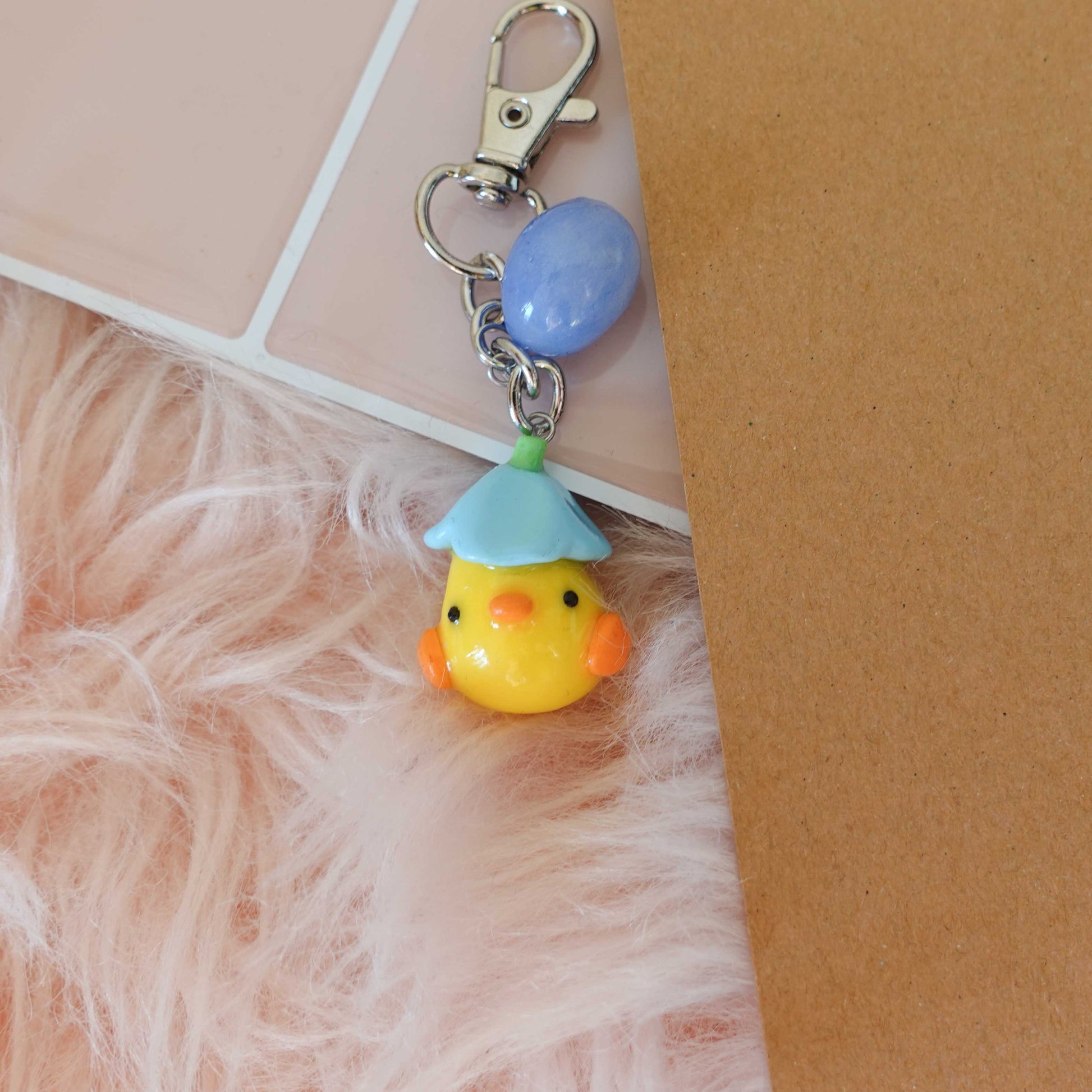 Charming duckling keychain designed for spring lovers, adding a playful element to your accessories.