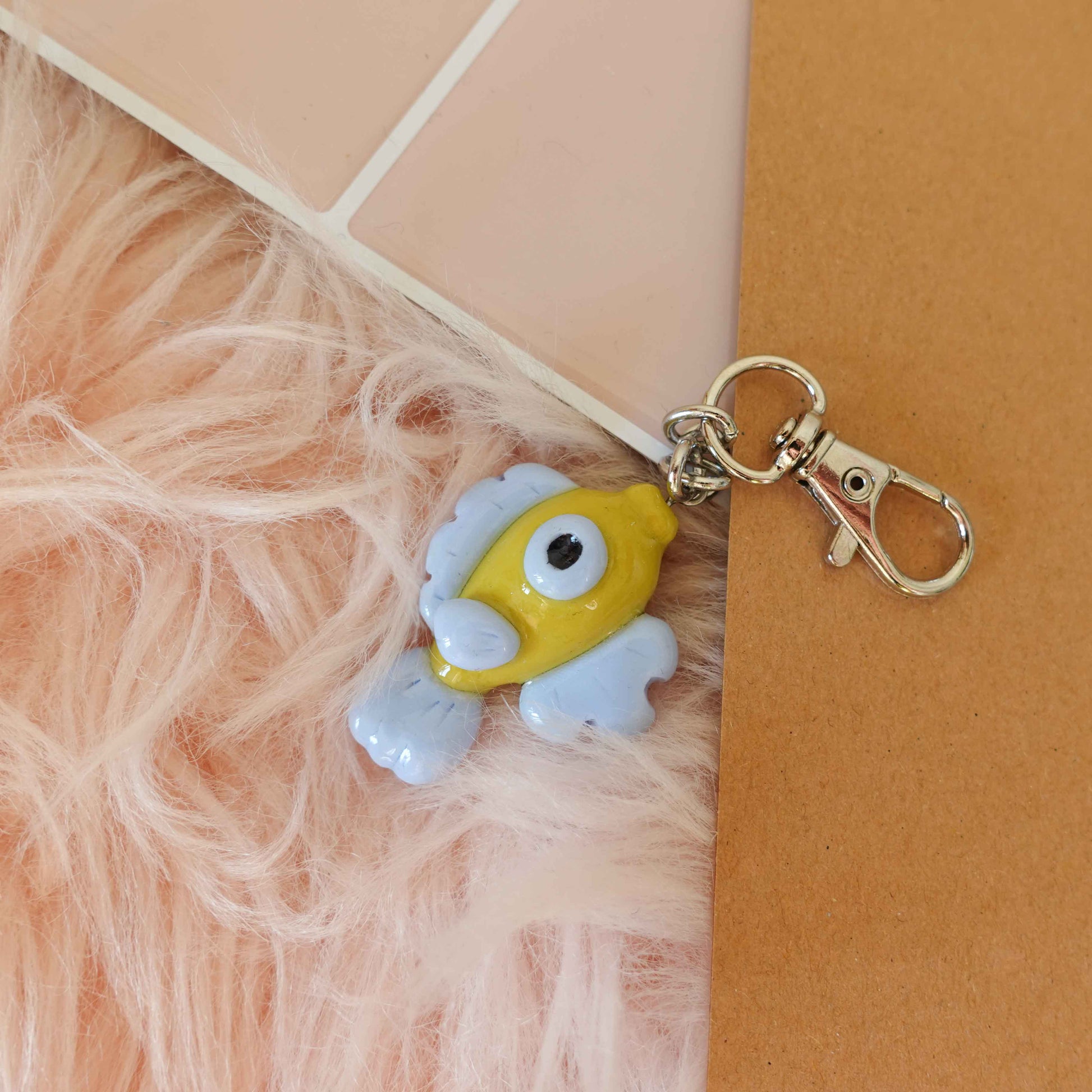 Charming fish keychain made from durable materials, ideal for brightening up your keyring this season.
