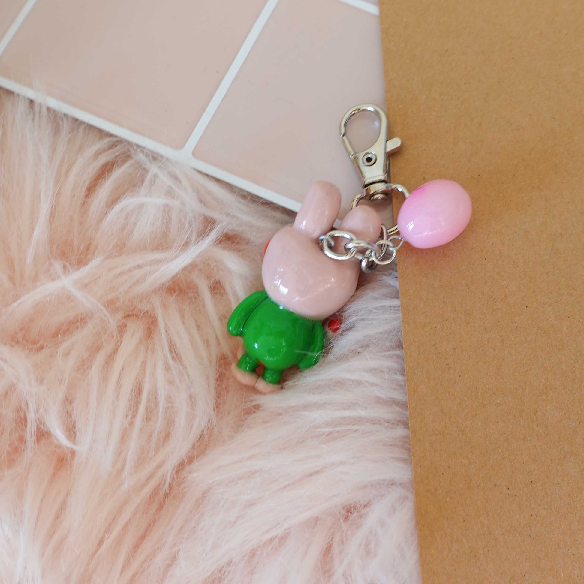 Adorable frog bunny keychain that adds a touch of charm and fun to your keyring or bag.