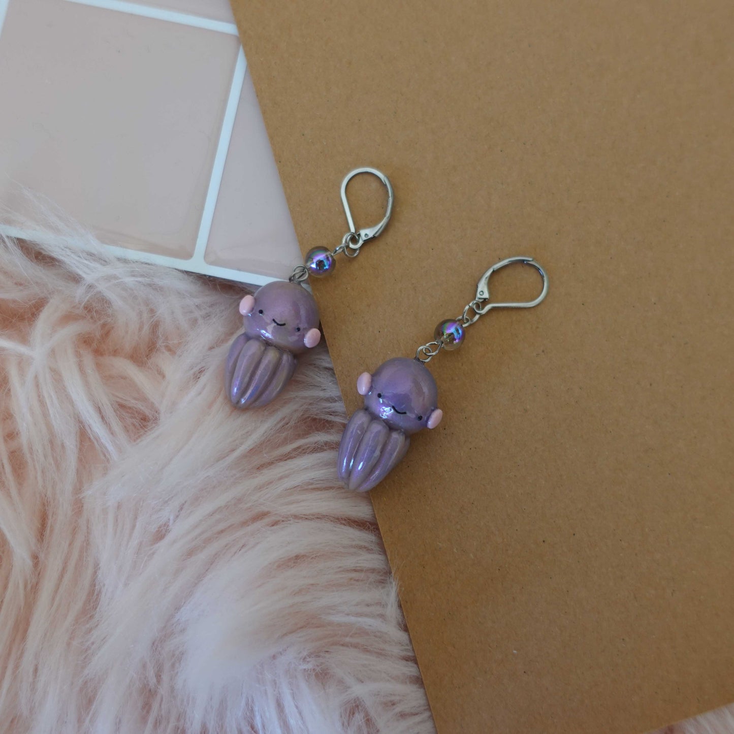 Whimsical octopus-shaped earrings made from lightweight materials, perfect for adding fun to spring outfits.