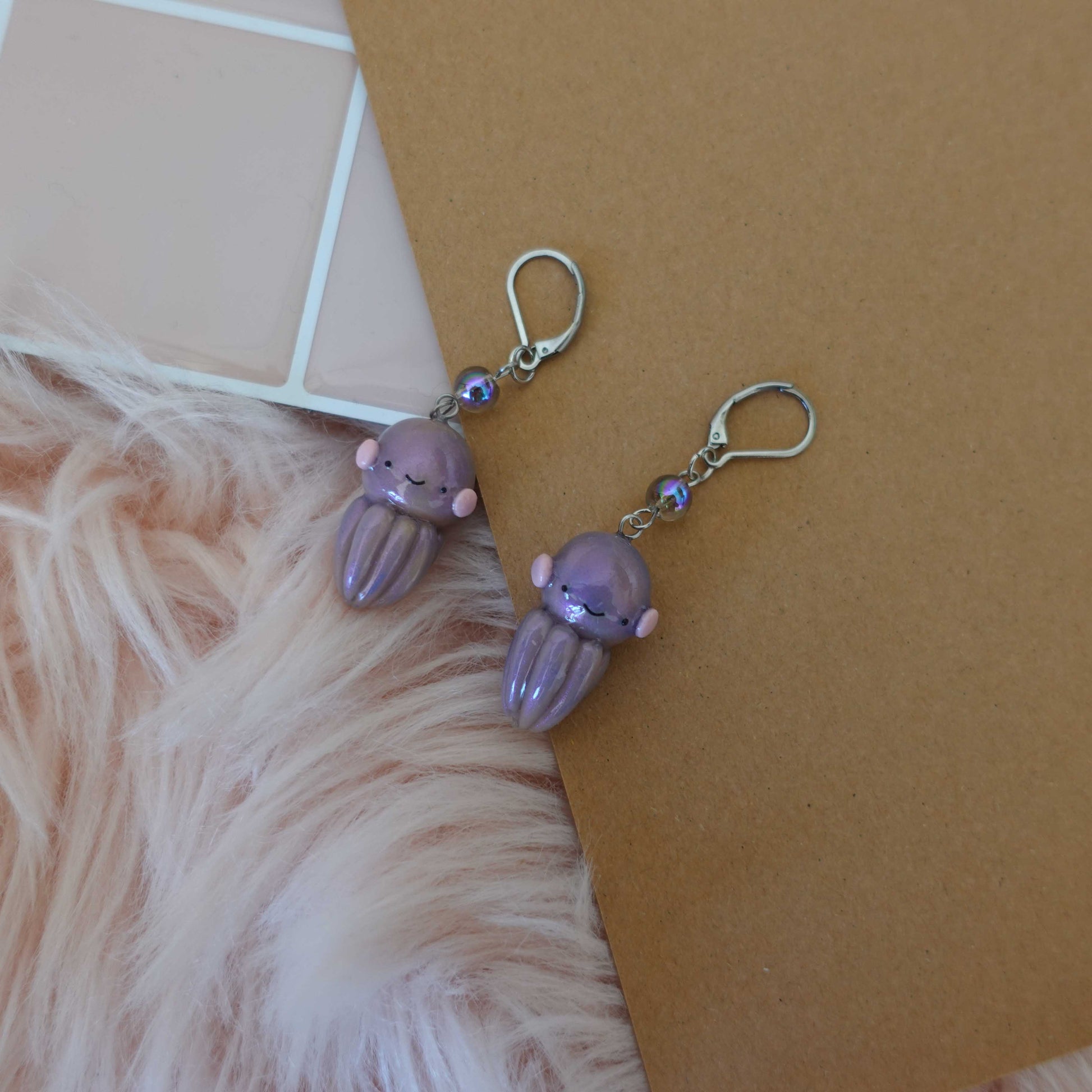 Whimsical octopus-shaped earrings made from lightweight materials, perfect for adding fun to spring outfits.