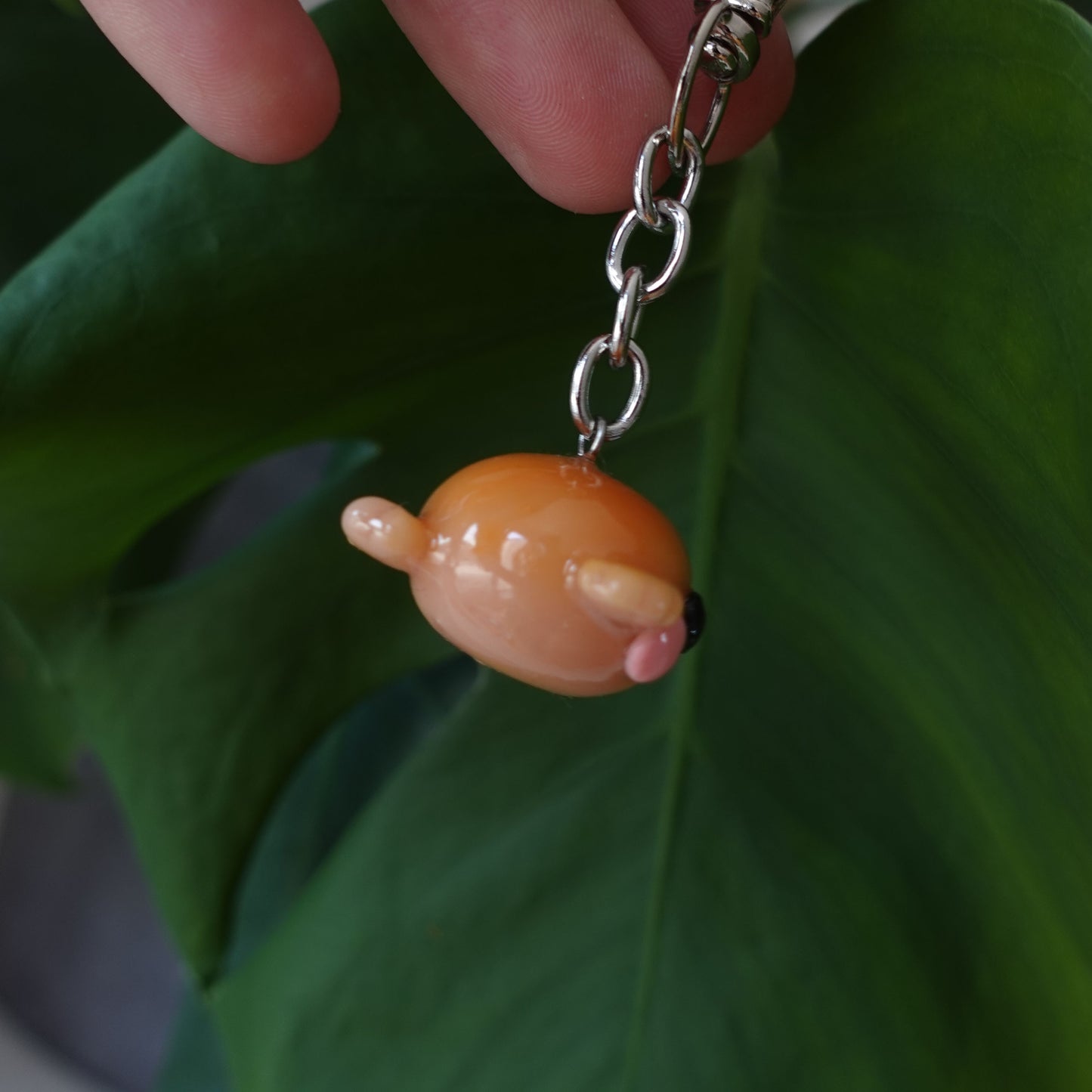 Playful blowfish keychain featuring a colorful design, perfect for nautical-themed accessories.