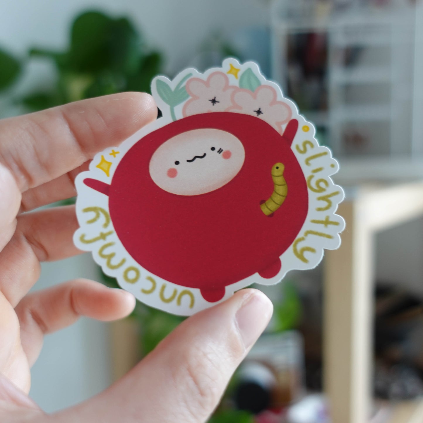 Slightly Uncomfy Cherry Sticker featuring a whimsical cherry design with a hint of discomfort, perfect for adding quirky charm to belongings.