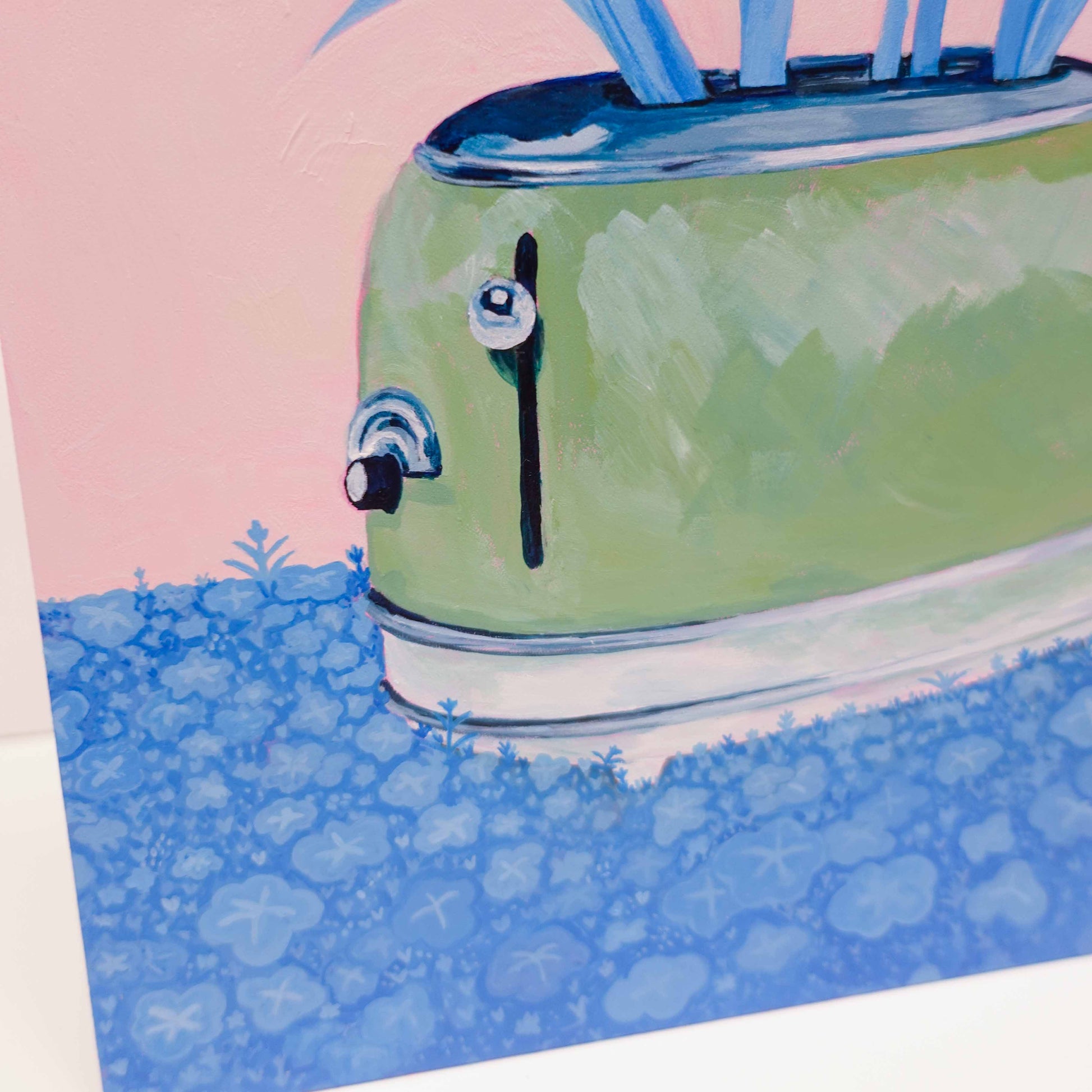 Acrylic artwork showing a household toaster transformed into a planter, blooming with tulips against a simple ground setting.