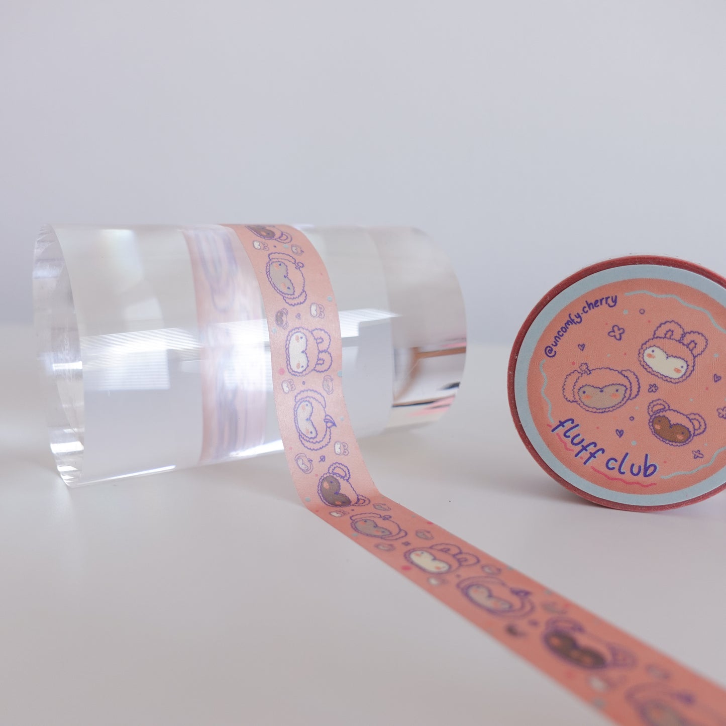 Roll of Fluff Club washi tape featuring a nostalgic, retro-inspired design perfect for journaling and crafting.