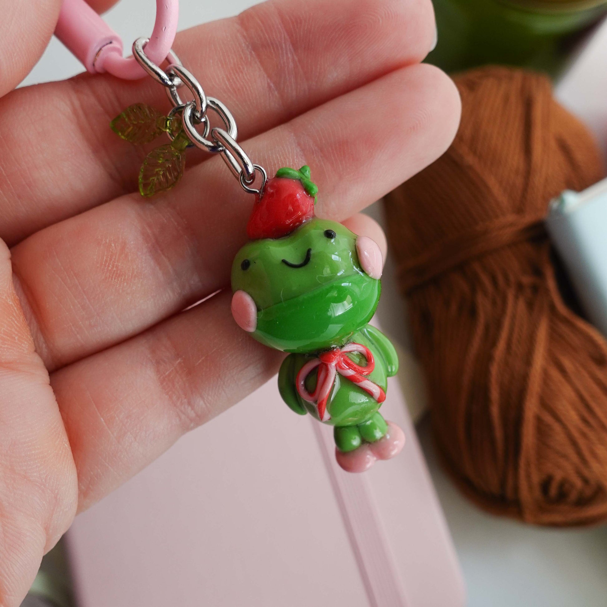 matcha frog keychain with a strawberry on head