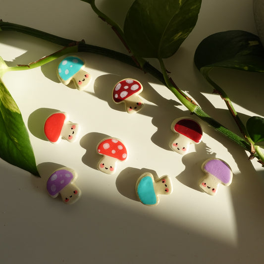 mushroom lucky charm magnets in various colors. clay charm resined to make them durable. perfect new years gift or present for the holidays to any kawaii lover and mushroom lover