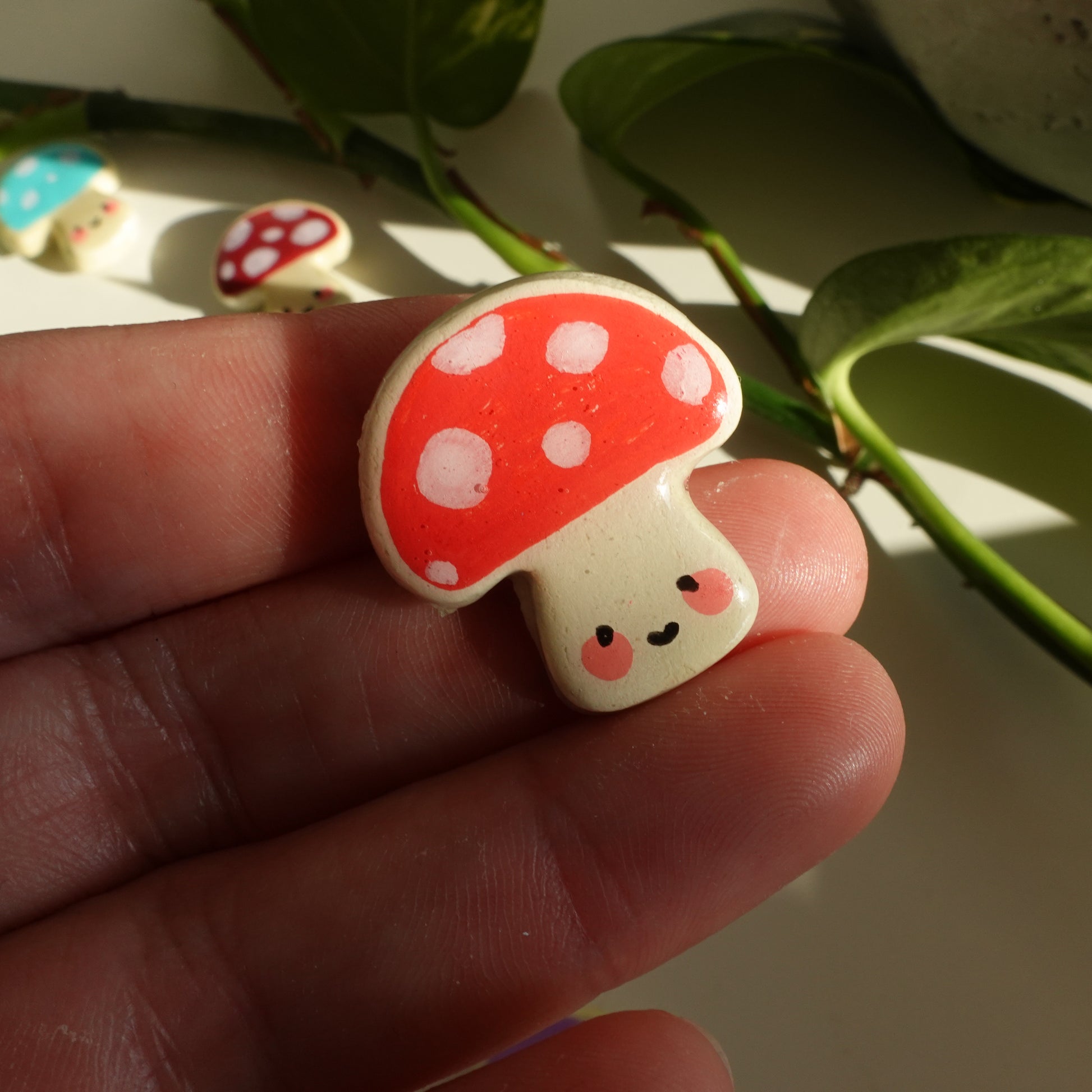 mushroom lucky charm magnets in red with dots. clay charm resined to make them durable. perfect new years gift or present for the holidays to any kawaii lover and mushroom lover