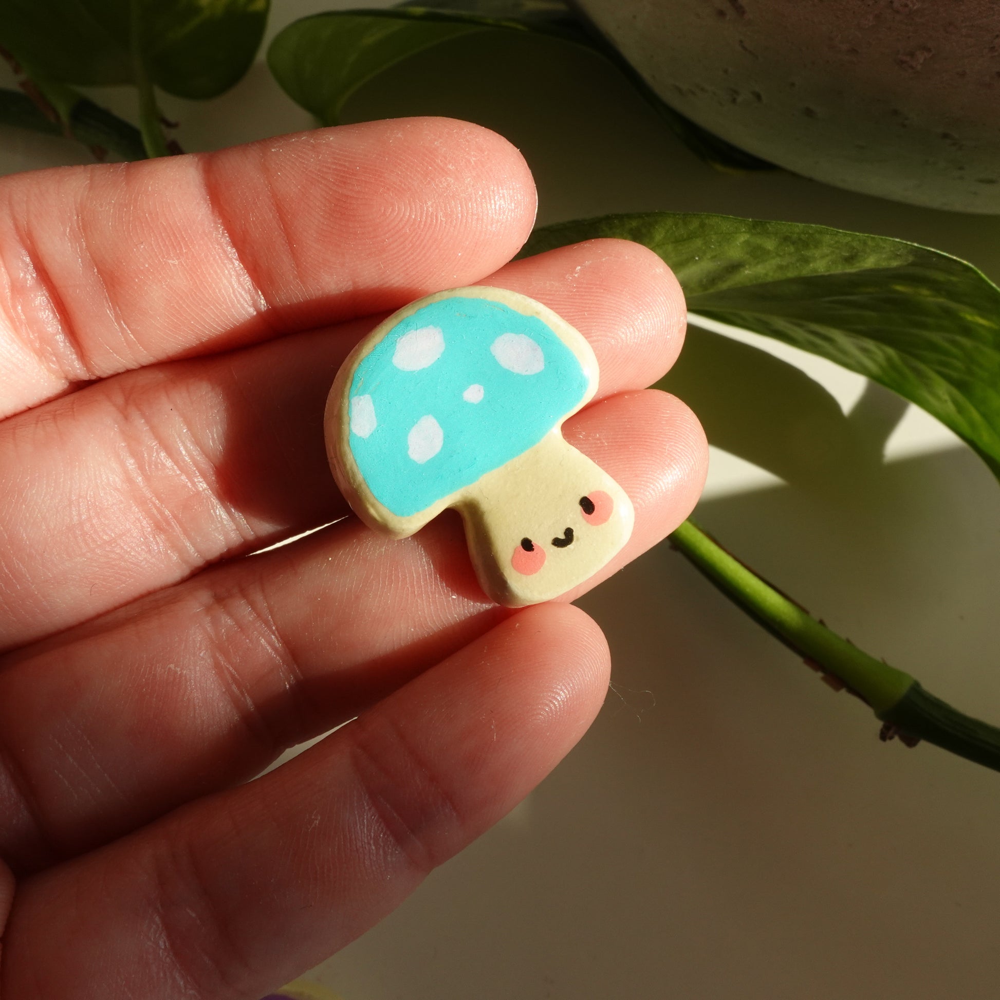 mushroom lucky charm magnets in teal with dots. clay charm resined to make them durable. perfect new years gift or present for the holidays to any kawaii lover and mushroom lover