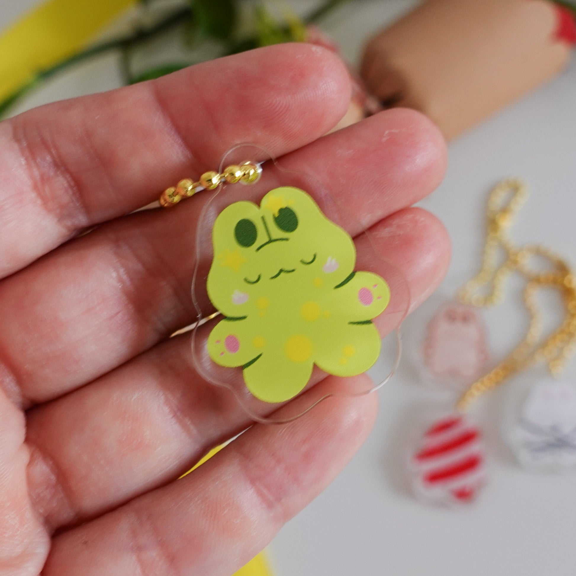 picture of one of the acrylic keychains which is a christmas tree bunny in kawaii style