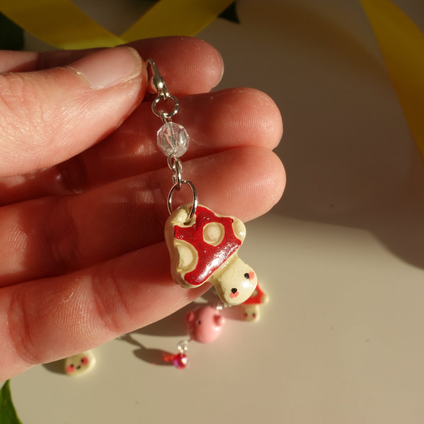 dark red mushroom lucky charm keychain