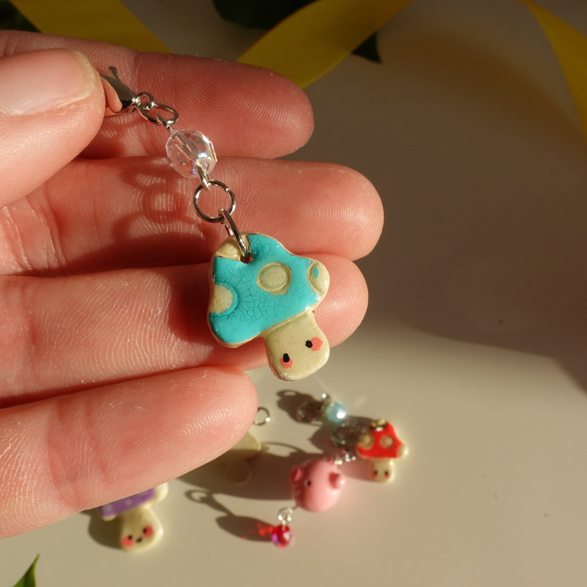 teal mushroom lucky charm keychain