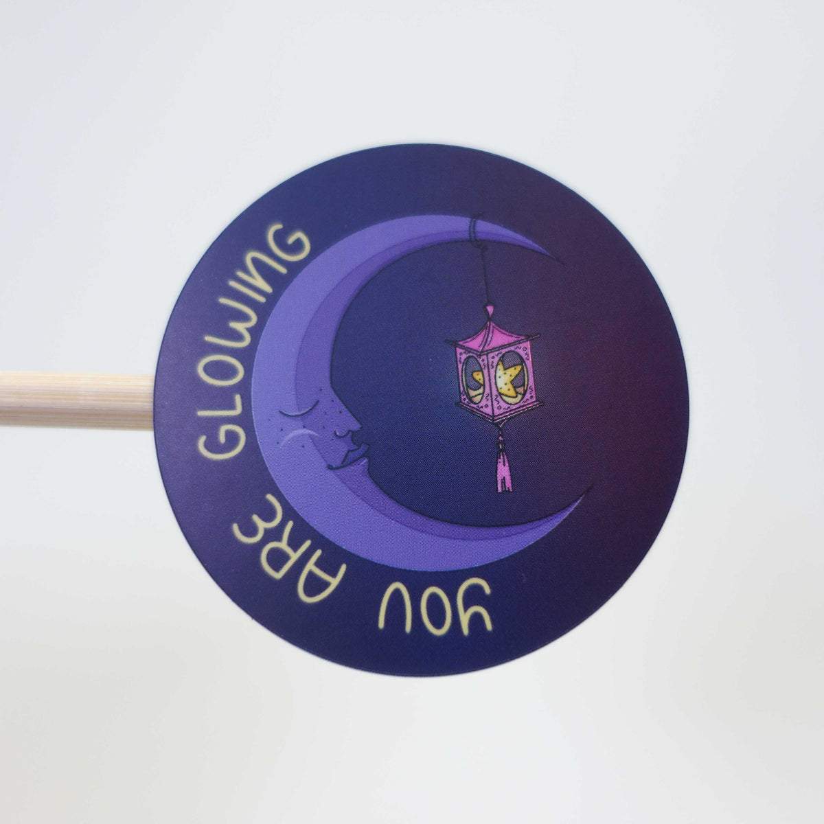 Cute motivational sticker with the text “You Are Glowing in Dark and Light”, featuring a cozy moon-inspired design from the Midnight Picnic collection. dark