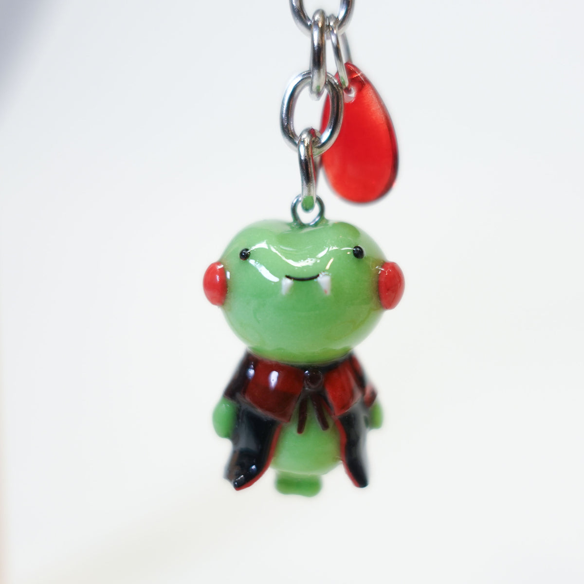 Mr. Frog Dracula kawaii Halloween keychain, handmade polymer clay vampire frog with Dracula cape and spooky details, part of the Midnight Picnic collection by Uncomfy Cherry.