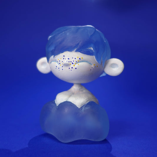 Small handmade Cloud Chaser sculpture with see-through blue “cloud” hair and body, 3D printed in resin, hand-painted and matte varnished, photographed on neutral background, one-of-a-kind.