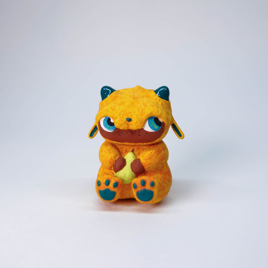 Hand-painted Pear Gremlin sculpture with orange fur, glossy horns, slight side-eye expression, 3D printed resin collectible figure, one-of-a-kind limited edition.