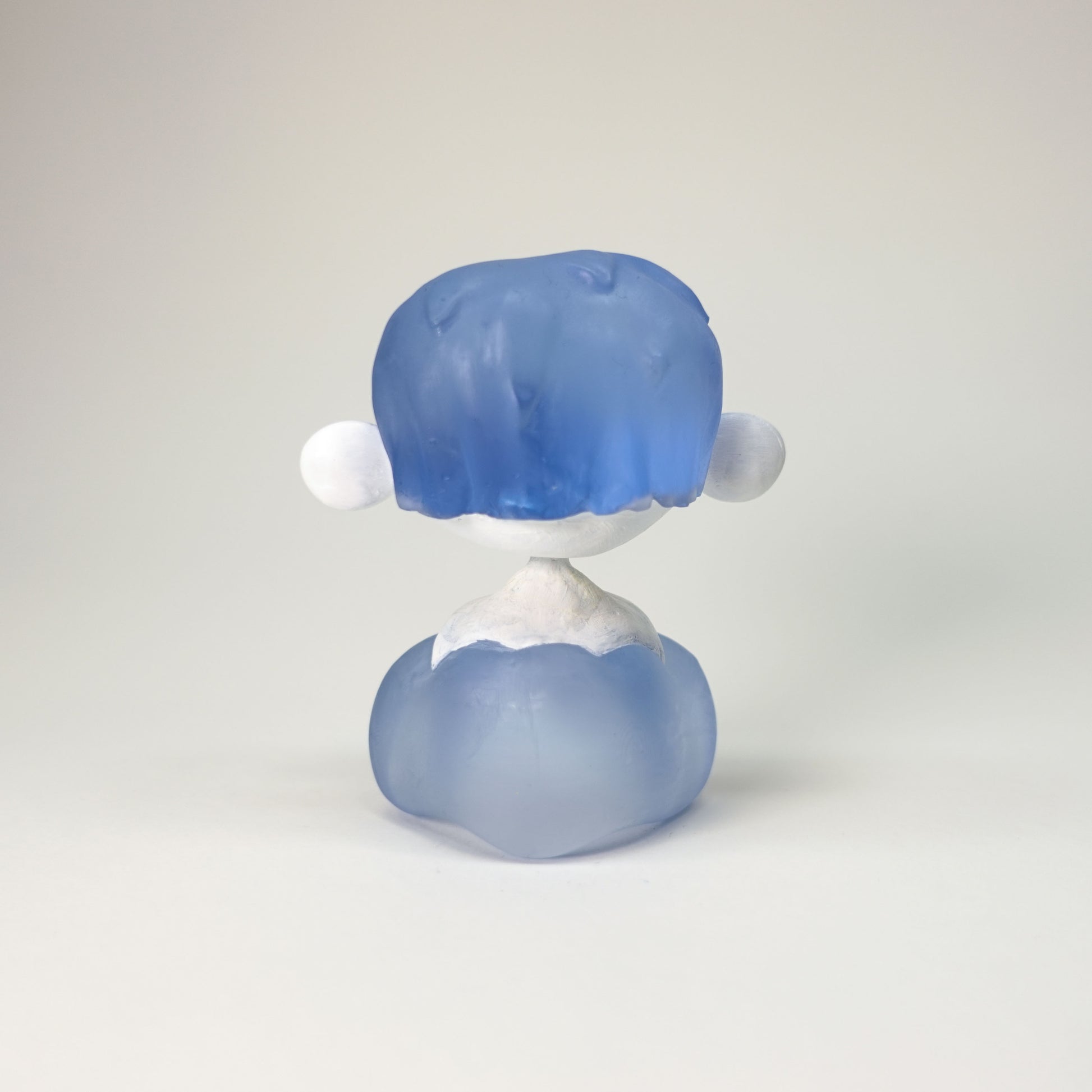 Hand-painted Cloud Chaser sculpture with pale body and transparent blue resin hair resembling a cloud, 3D printed unique collectible resin figure, matte finish, one-of-a-kind.