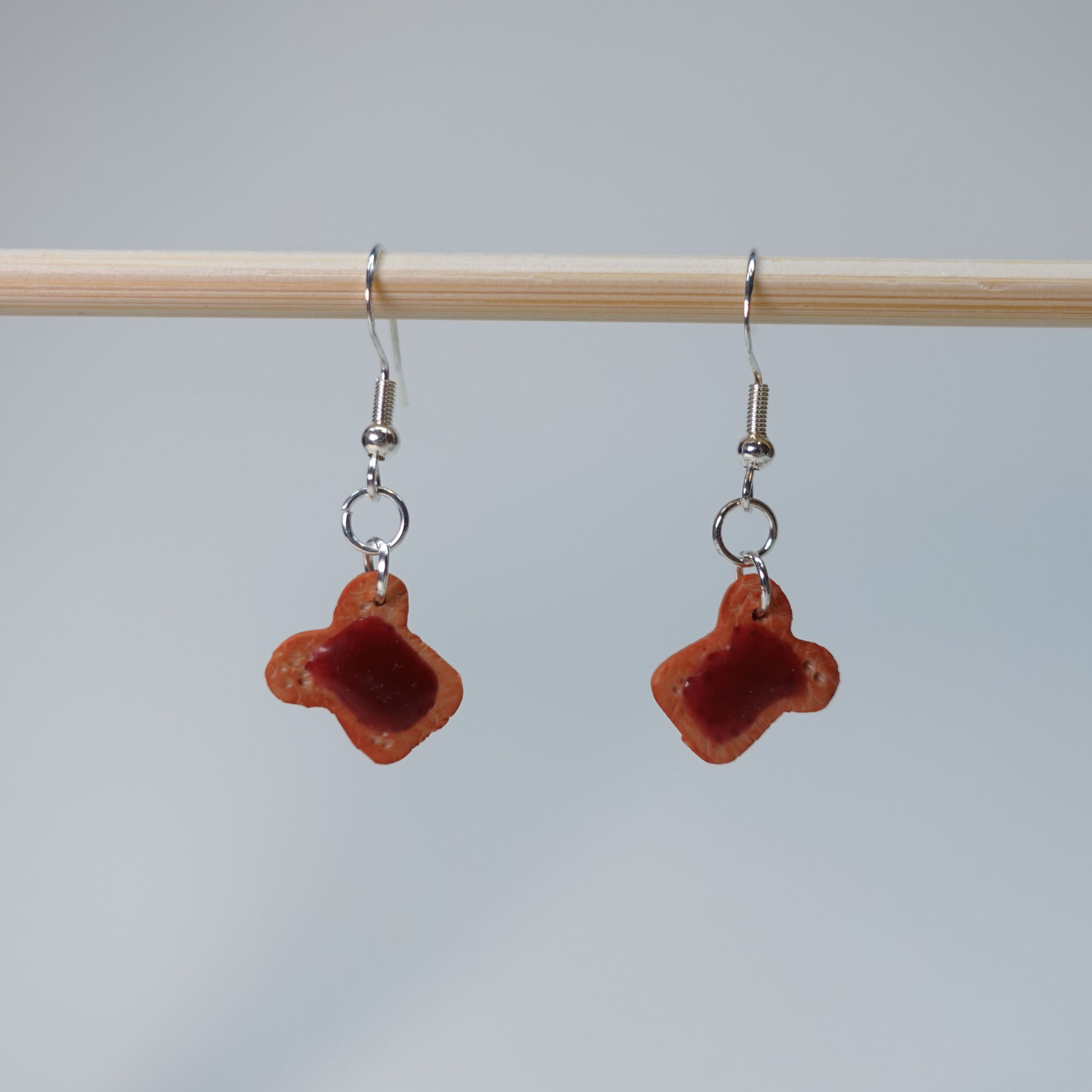 Handmade toast earrings with blueberry, strawberry, and slightly burned designs, five unique pairs, cute pastel jewelry accessory, limited edition.