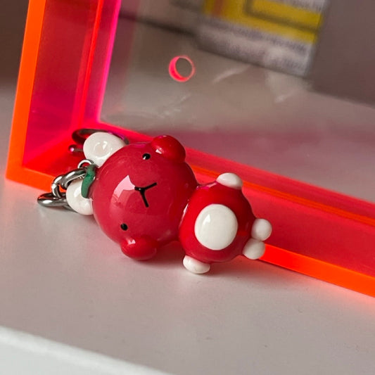 watermelon bunny keychain out of polymer clay and uv resin for durability. an all orange kawaii bunny creature to hang onto your purse, keys or bag or gift for your friends and family