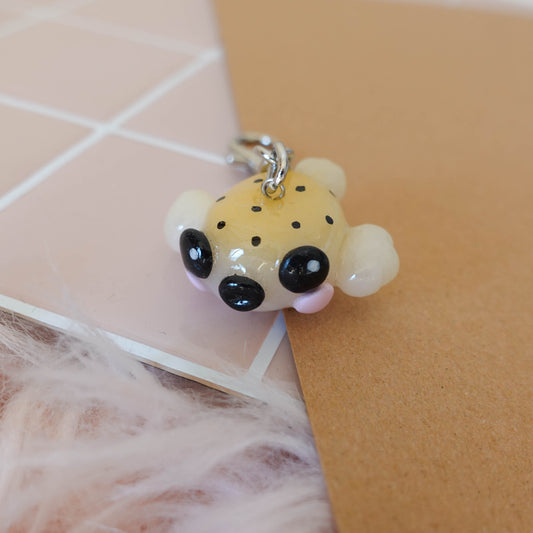 Playful blowfish keychain featuring a colorful design, perfect for nautical-themed accessories.