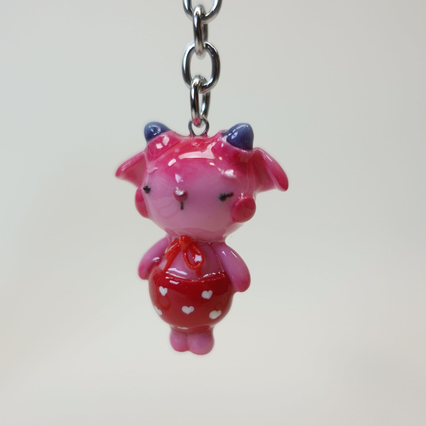 Handmade polymer clay deer keychain with glossy UV resin. A cute woodland-inspired accessory with a nostalgic feel.
