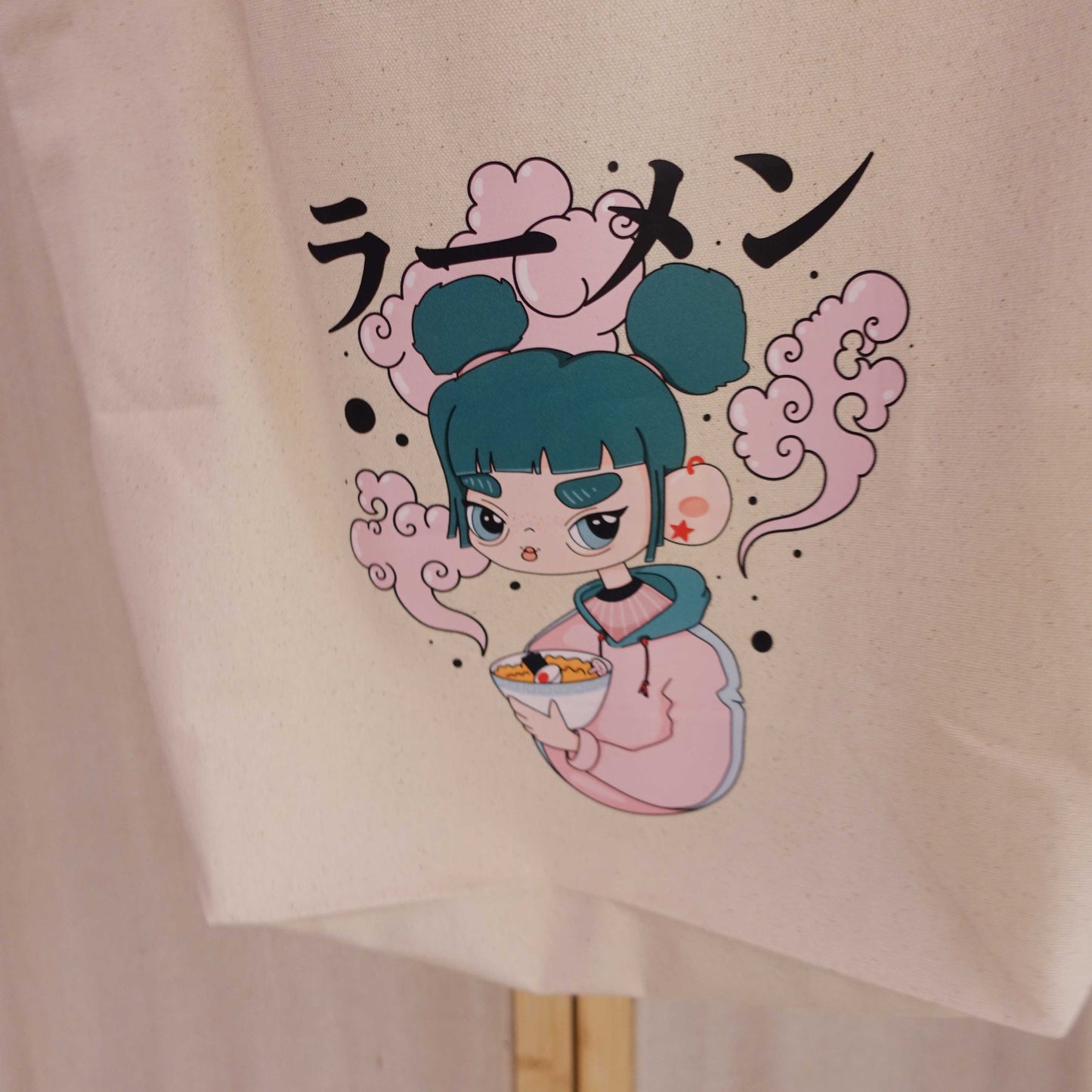 Cotton canvas shopper bag featuring the original Ramen Girl illustration. A reusable tote for everyday adventures.