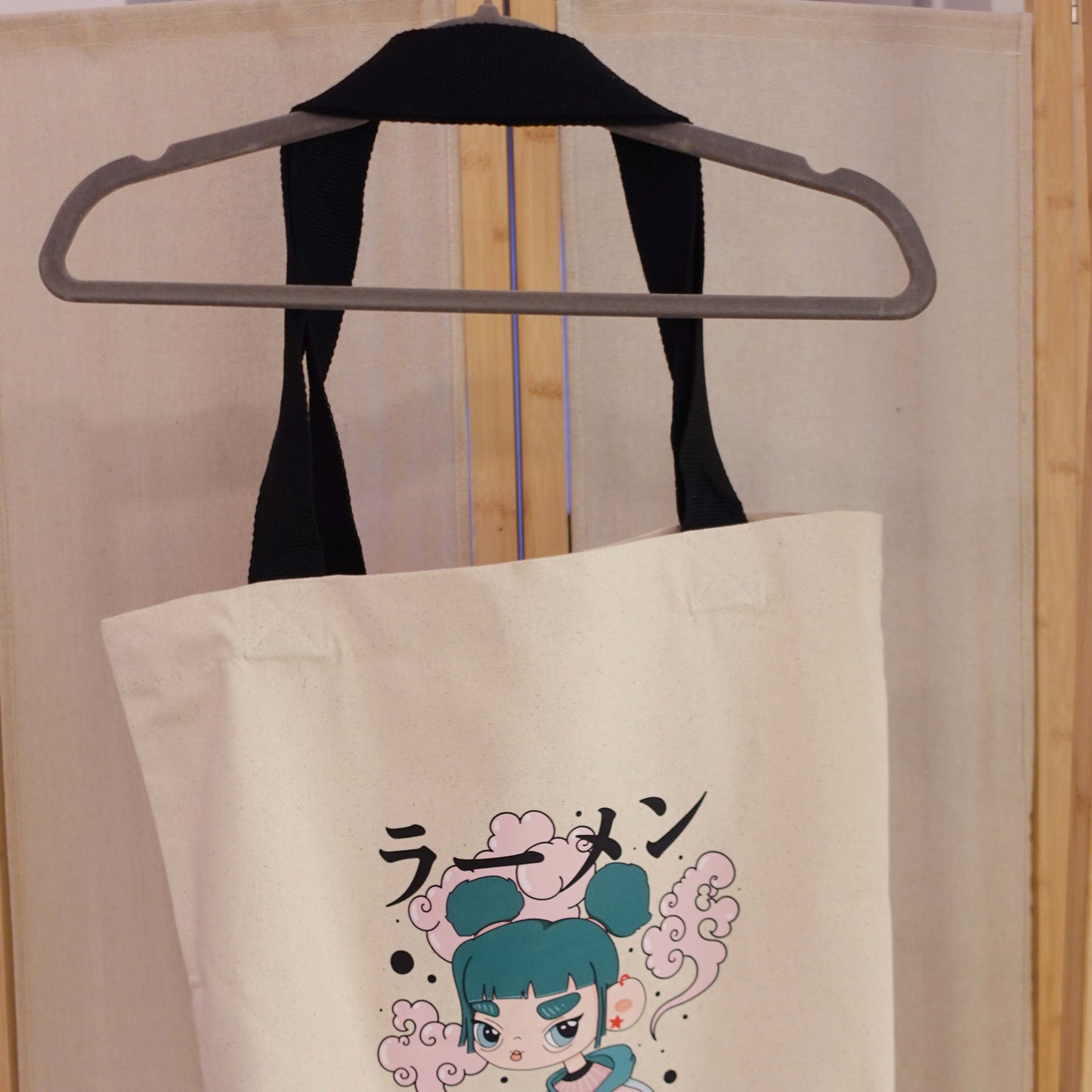 Cotton canvas tote bag printed with the illustrated Ramen Girl design.
